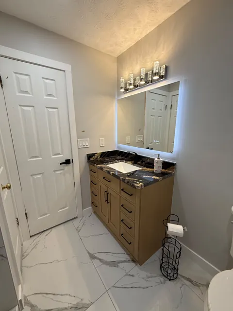 Bathroom Vanity, Countertop & Flooring Remodeling by Novahaus Remodels